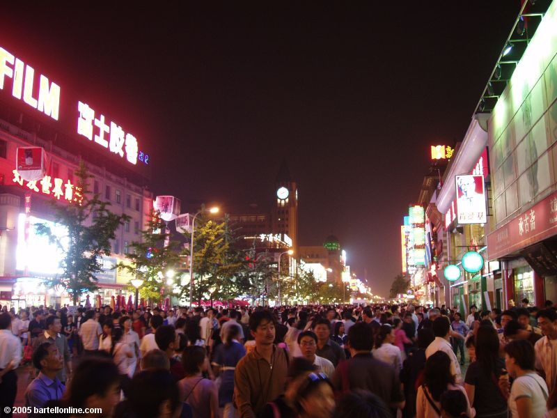 Nighttime crowd on Wangfujing shopping street in Beijing, China