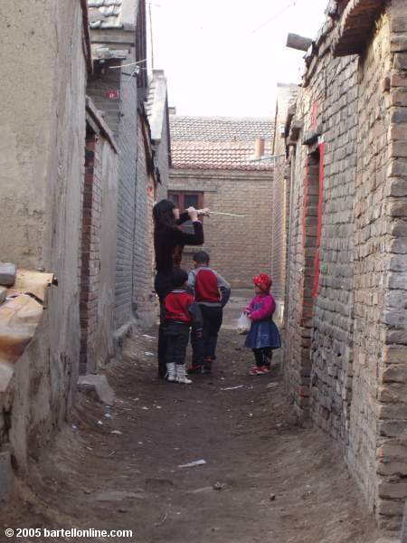 Alley scene in old section of Hohhot, Inner Mongolia, China