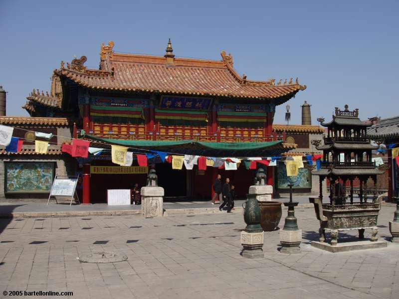 Building, courtyard, and large incense burner at Dazhao Temple in Hohhot, China