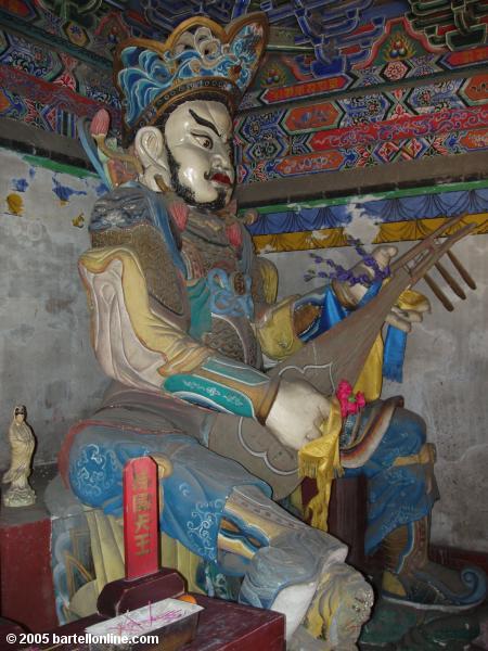A guardian figure at Xilituzhao Temple in Hohhot, Inner Mongolia, China
