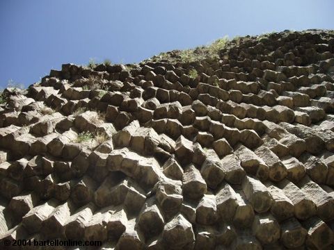 View from below of basalt cliffs in the Azat river gorge near Garni, Armenia
