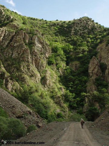 A hiker in the Arpi river gorge near Jermuk, Armenia
