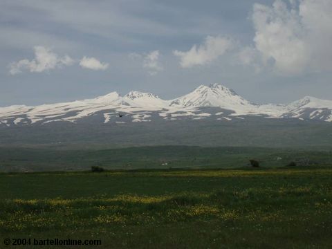 Field and Mt. Aragats seen from near Artashavan, Armenia
