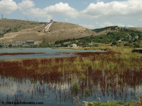 The world-famous pipes in Hrazdan, Armenia from the shore of the lake
