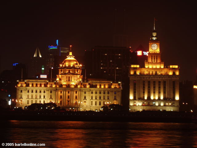 Night view of the Hong Kong and Shanghai Bank and Customs House buildings on The Bund in Shanghai, China