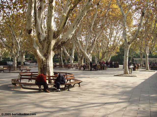 Men playing Chinese chess in Fuxing Park in Shanghai, China