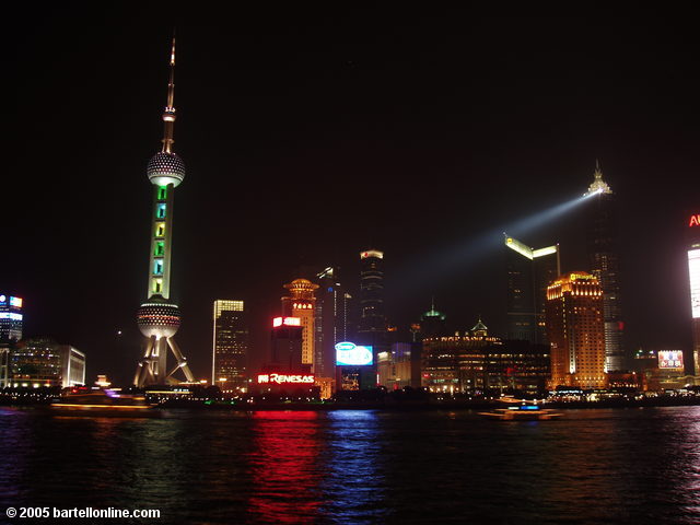 Night view of the Oriental Pearl TV Tower and Pudong as seen from The Bund in Shanghai, China