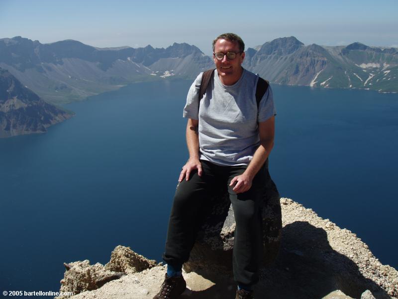 Author atop Tianwen Peak over Tianchi Lake in the Changbaishan Nature Preserve in Jilin, China