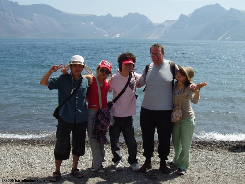 Author poses with Korean students beside Tianchi Lake in the Changbaishan Nature Preserve in Jilin, China