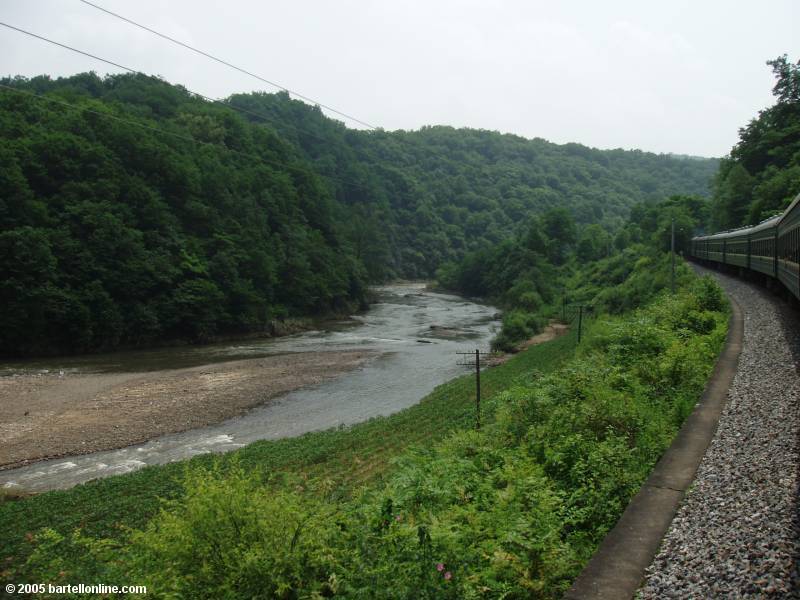 View from the window of a passenger train traveling through northeast China