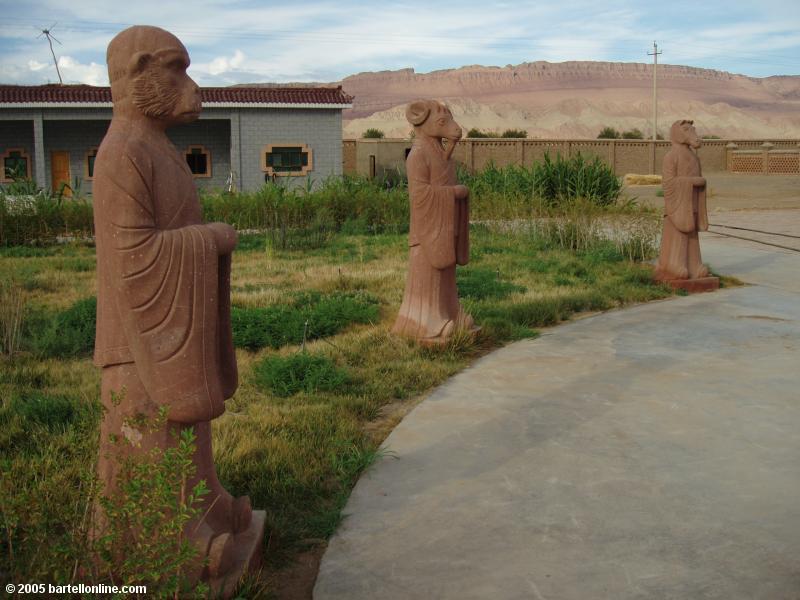 Chinese zodiac animal carvings at Astana Tombs near Turpan, Xinjiang, China