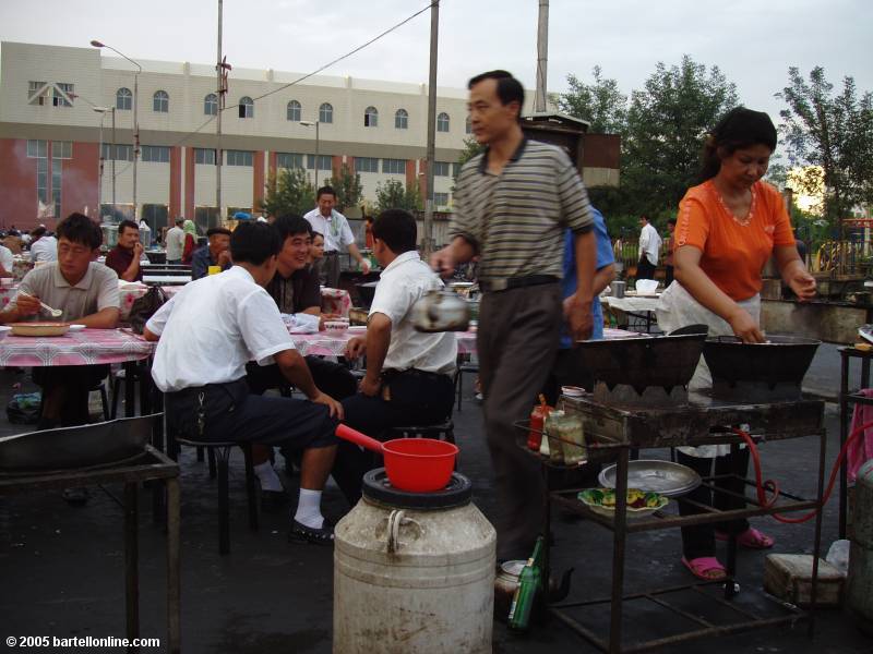 Kitchen of an outdoor restaurant in Turpan, Xinjiang, China