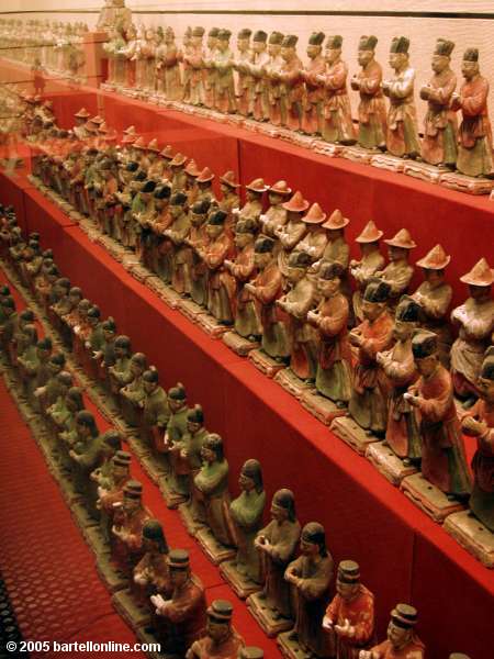 Small pottery guard figures inside the Shaanxi History Museum in Xi'an, China