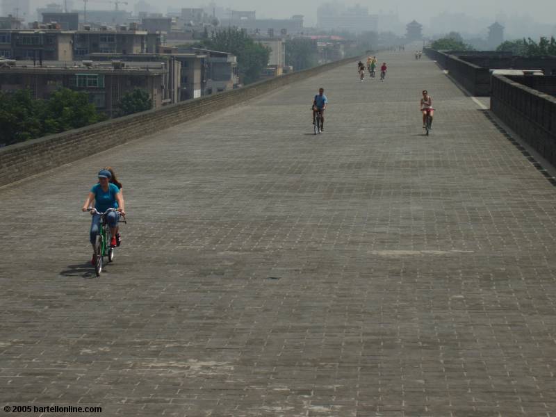 Bicyclists atop the city wall around Xi'an, Shaanxi, China