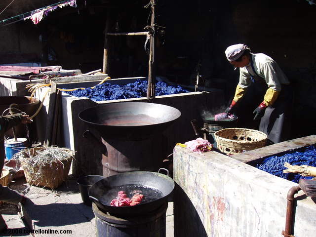 Worker at a batik and tie-dye factory in a village outside Dali, Yunnan, China