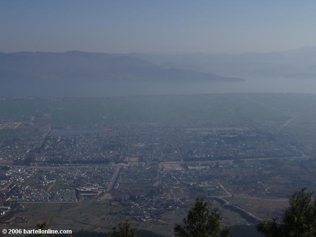 View of the walled Dali old city with Erhai lake in the background as seen from Zhonghe Temple