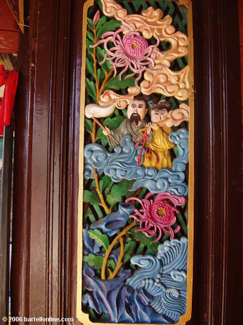 Colorful woodwork at the Zhonghe Temple in the Cangshan mountains above Dali, Yunnan, China