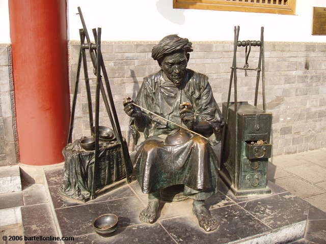 A sculpture along the street between the East and West Pagodas in Kunming, Yunnan, China