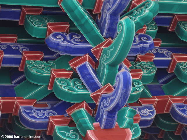 Detail of colorful eaves on building inside Yuantong Temple in Kunming, Yunnan, China