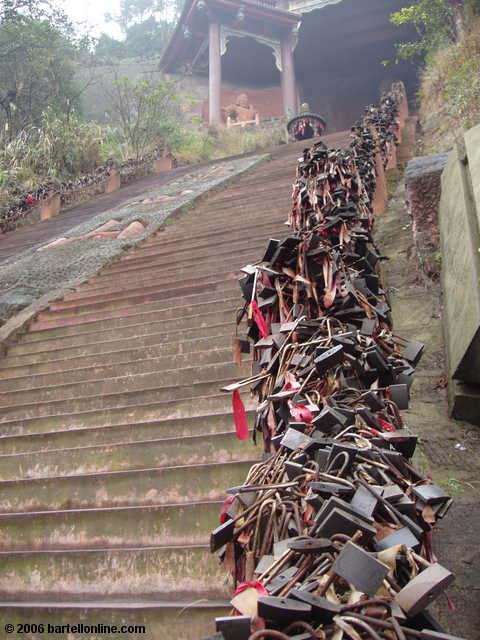 Padlocks on a stairway handrail in the Giant Buddha scenic area in Leshan, Sichuan, China