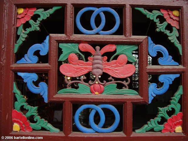 Colorful woodwork at Qingyang Temple in Chengdu, Sichuan, China