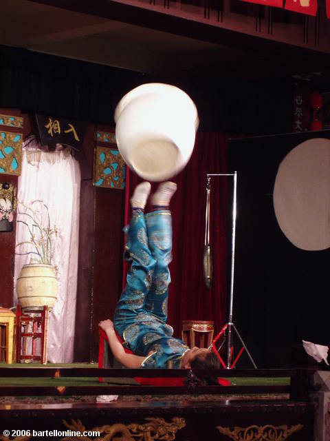 Juggling acrobat at a Sichuan Opera performance in Chengdu, China