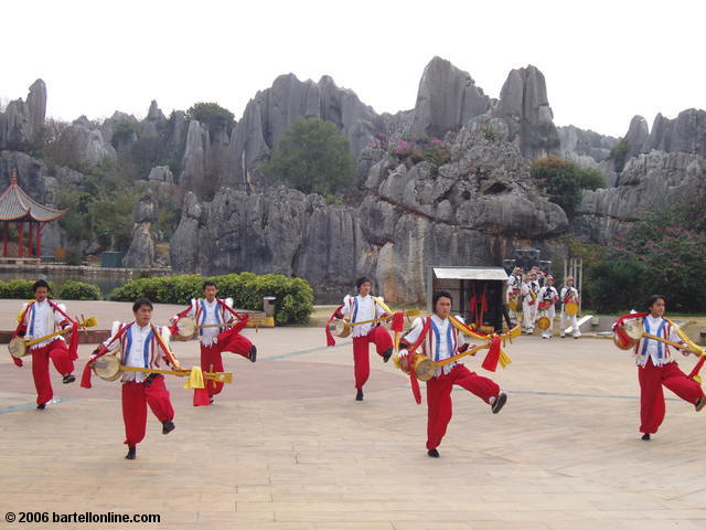 Costumed dancers at the Stone Forest near Kunming, Yunnan, China