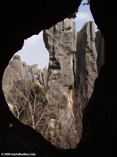 Looking out from a small cave at the Stone Forest near Kunming, Yunnan, China