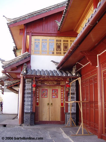 Doorway decorated for the Lunar New Year on a house in the Old Town of Lijiang, Yunnan, China
