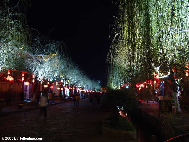 Lighted trees line a street in the Old Town of Lijiang, Yunnan, China