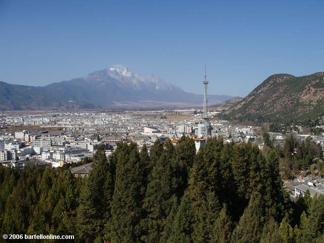 View of Lijiang, Yunnan, China and Jade Dragon Snow Mountain seen from the Wangu Tower