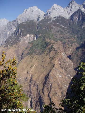 View of Jade Dragon Snow Mountain from the upper trail through Tiger Leaping Gorge in Yunnan, China