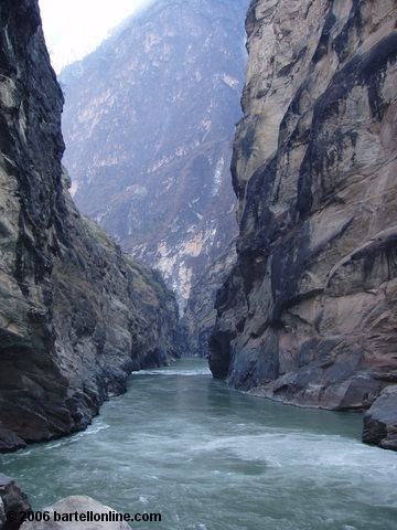 The Jinsha River, which later becomes the Yangtze, flows through a narrow section of Tiger Leaping Gorge in Yunnan, China