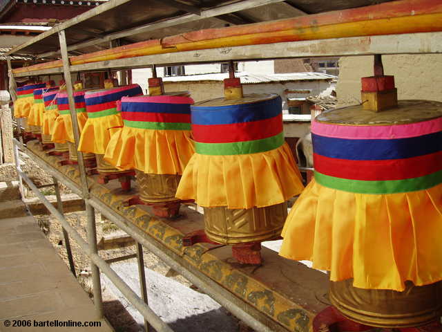 Buddhist prayer wheels with colorful covers in the Songzanlin Monastery near Zhongdian ("Shangri-La"), Yunnan, China