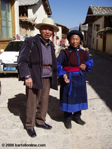 A local couple poses on the street in Zhongdian ("Shangri-La"), Yunnan, China
