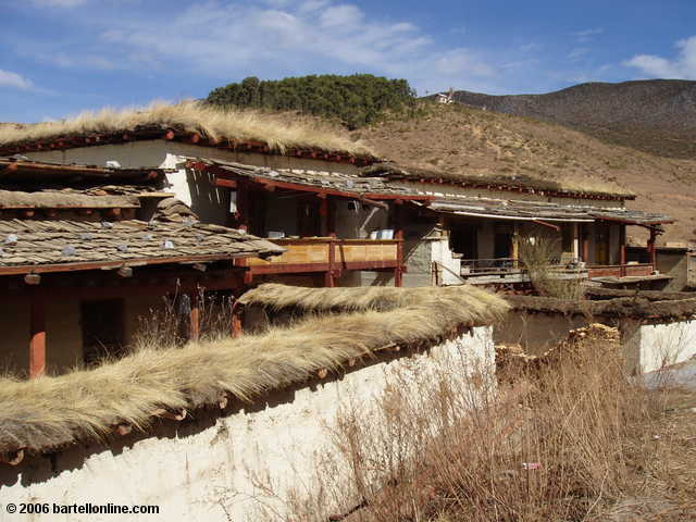 Sod-roofed buildings outside the Songzanlin Monastery near Zhongdian ("Shangri-La"), Yunnan, China