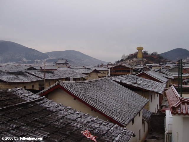 Light dusting of snow on the roofs of Zhongdian ("Shangri-La"), Yunnan, China as seen from the Tibetan Hotel